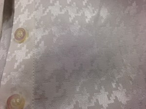 Not houndstooth - Rachel Roy . Satin damask in silk and cotton.